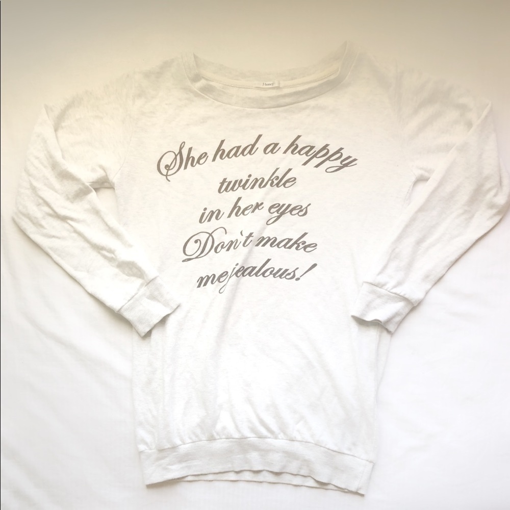 “SHE HAD A HAPPY TWINKLE IN HER EYES...” SWEATER